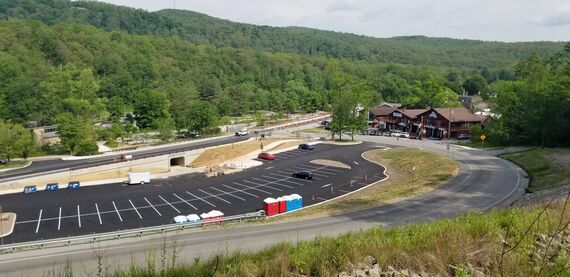 view of relocated sugarloaf road reconfigured green infrastructure parking lot pedestrian underpass and upgraded route 381